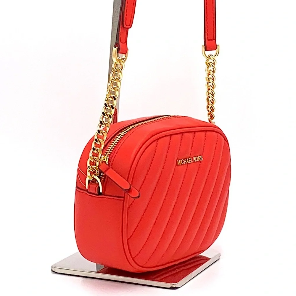 MICHAEL KORS ROSE SM OVAL CAMERA XBODY DR SANGRIA